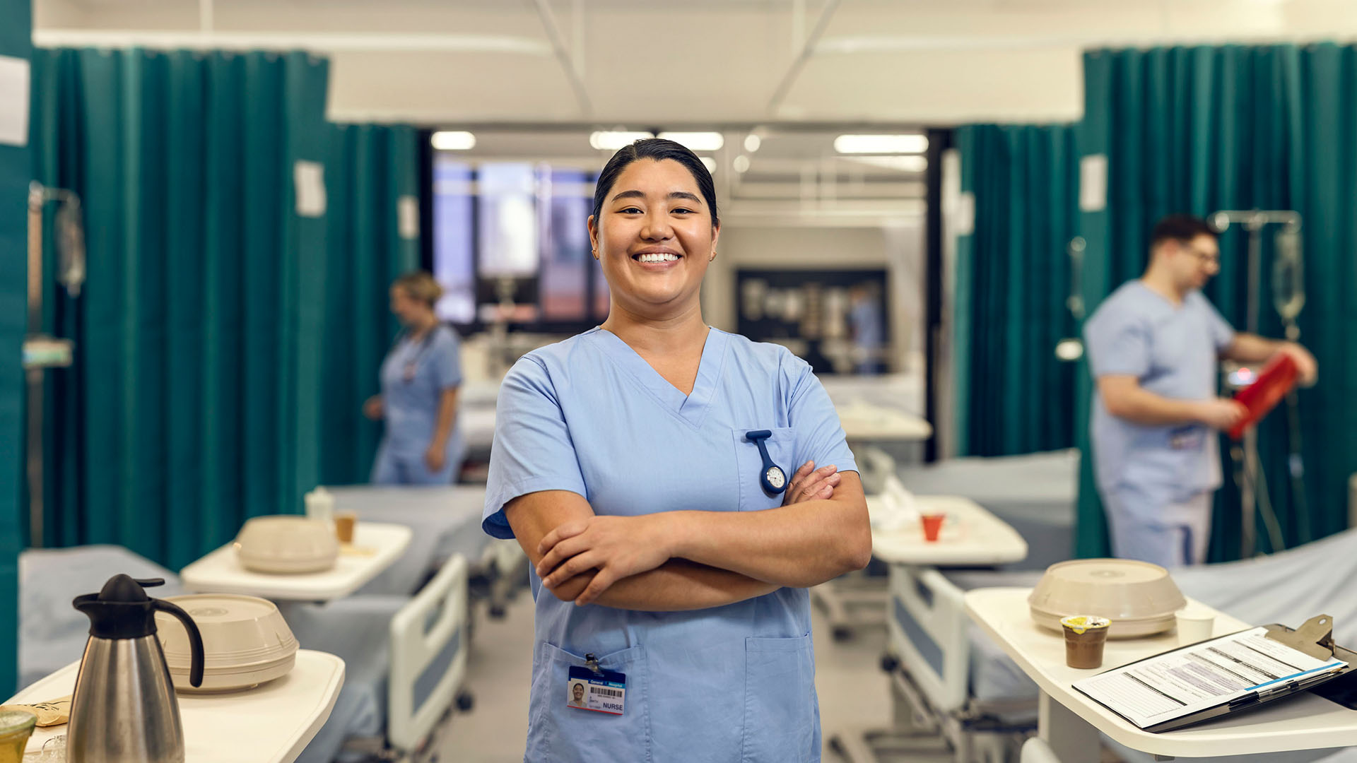 Photograph of a nurse interacting with a patient