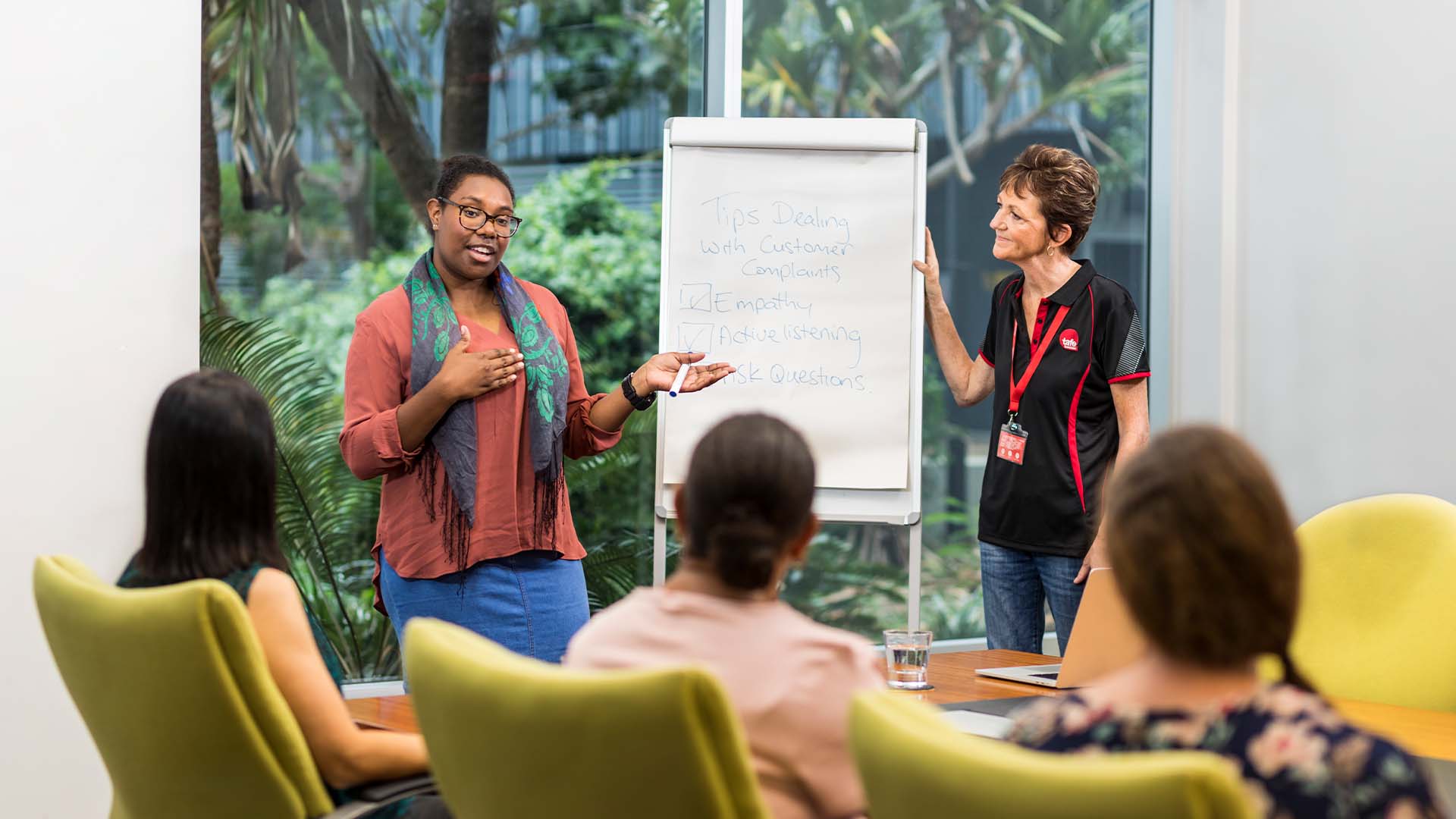 Professional presenting to colleagues
