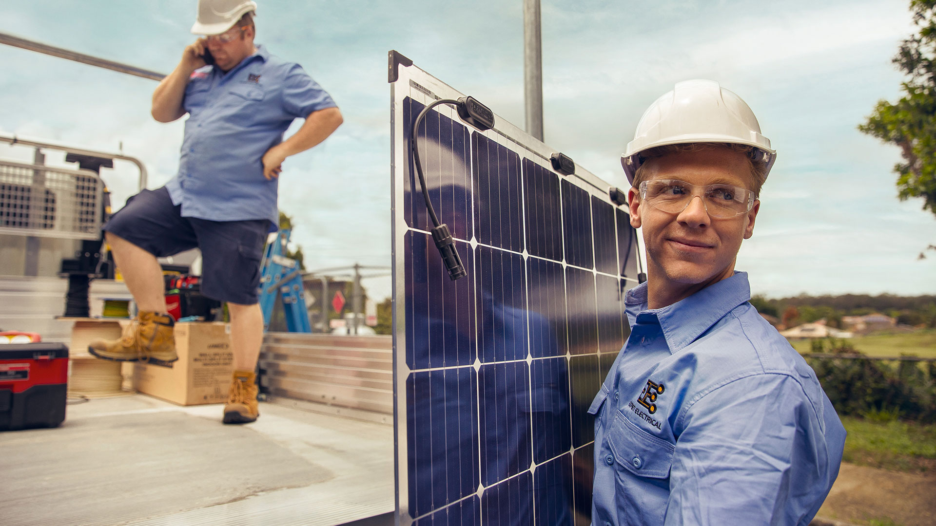 student and teacher laying pipe
