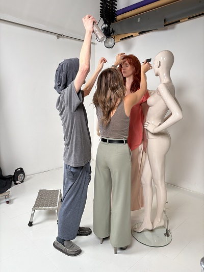 Hairdressers preparing for a photoshoot