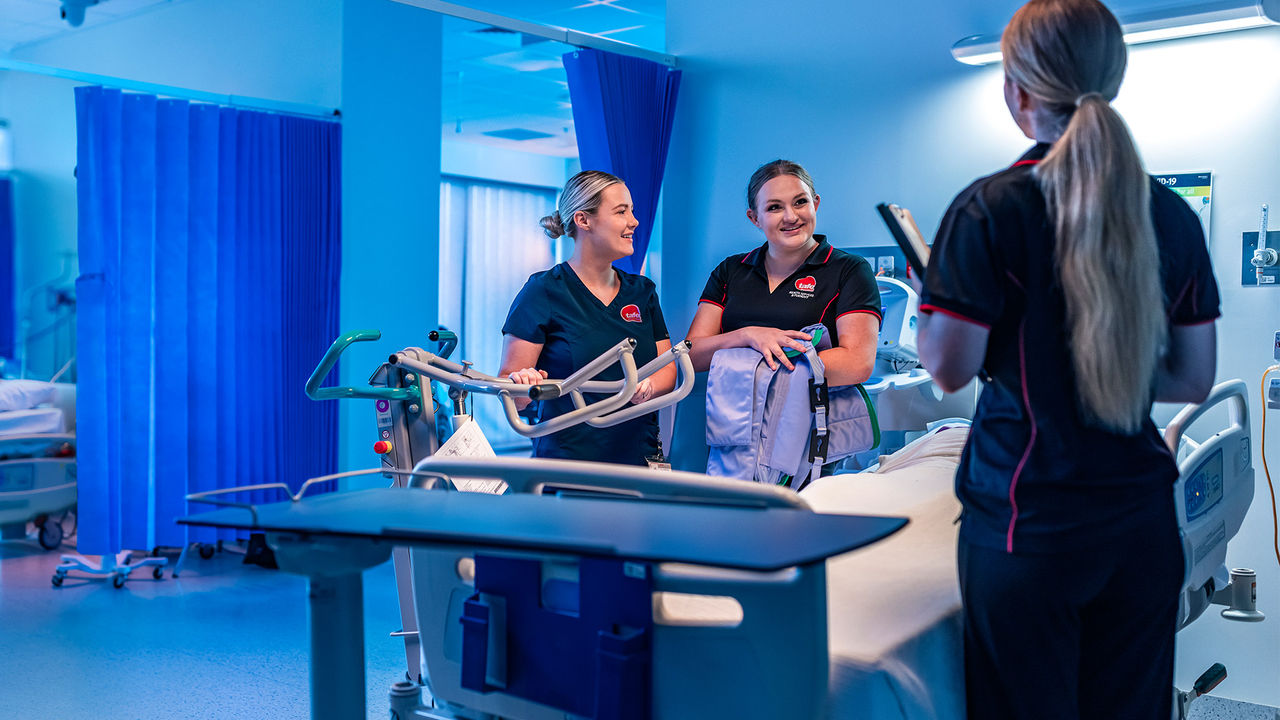 A photograph of TAFE Queensland students studying general education