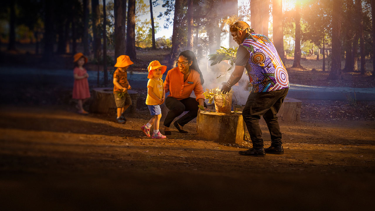 A photograph of a smoke ceremony with TAFE Queensland childcare students